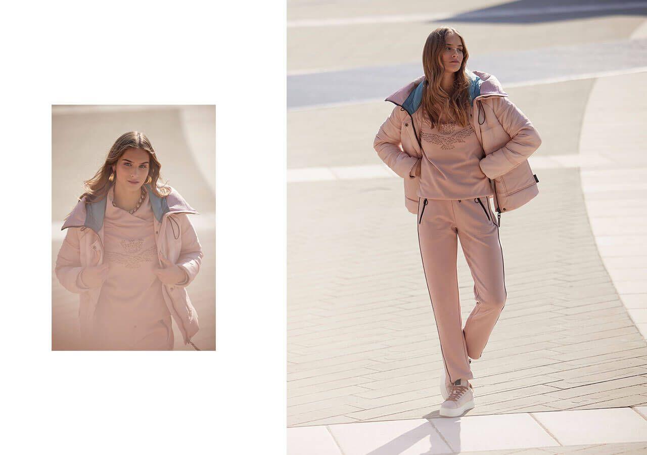 woman in pink tracksuit set