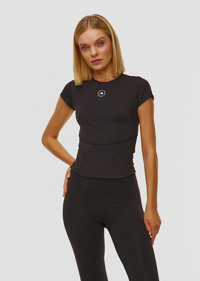 Woman in black sports set for the gym Woman in black sports set for the gym